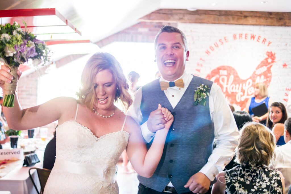 A couple coming down the aisle after being married