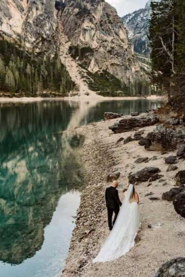 A couple walking through the Italian Dolomites