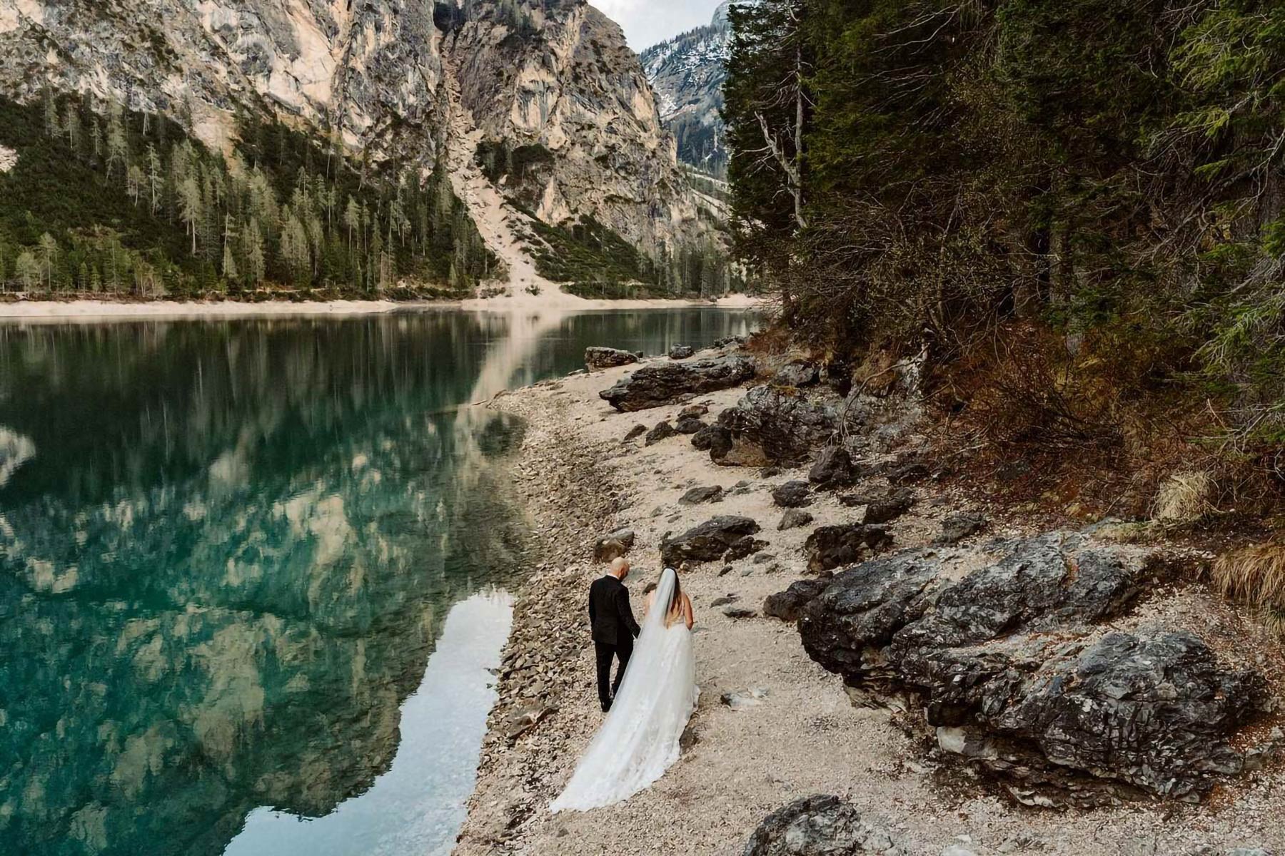 A couple walking through the Italian Dolomites