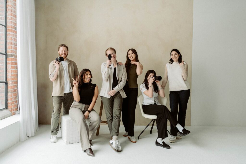 A group shot of photographers in a studio
