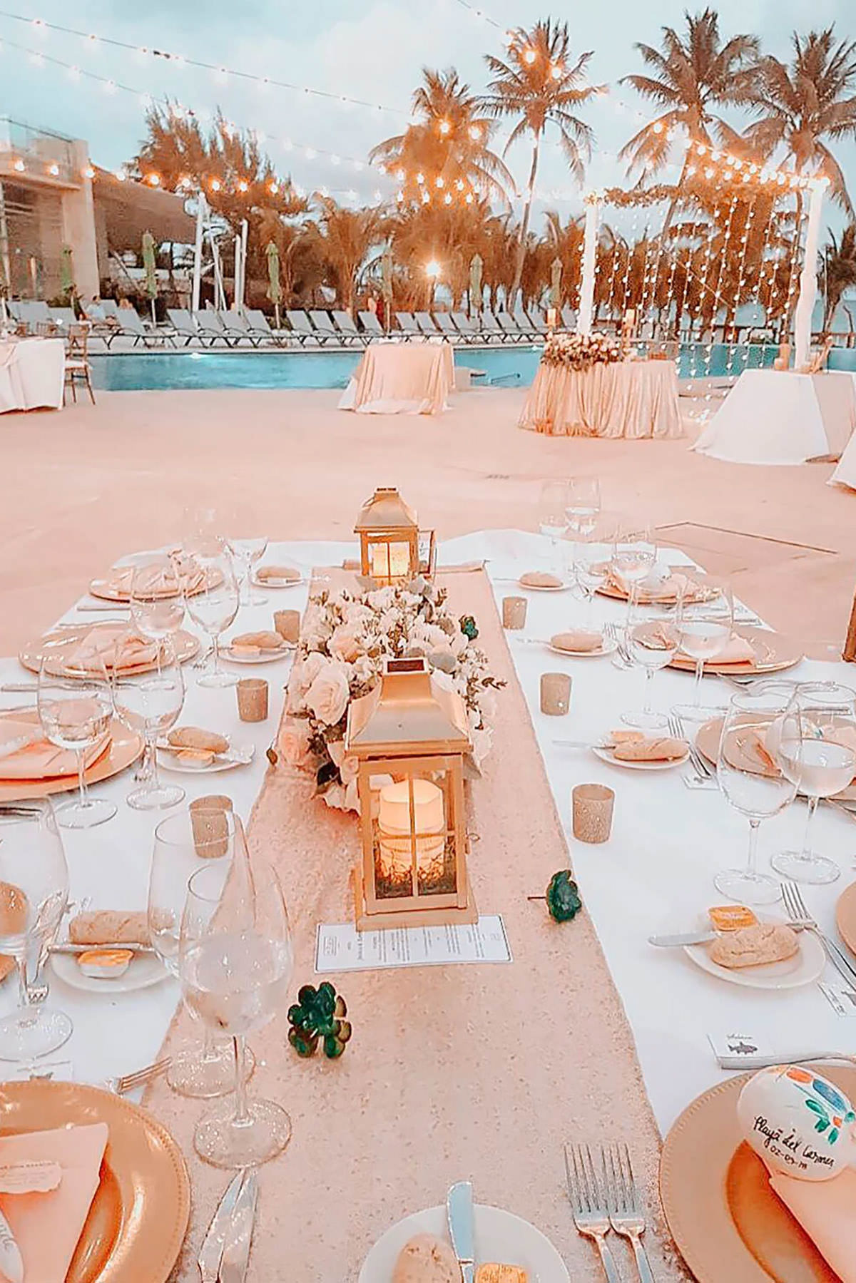 A tropical, pool-side wedding table