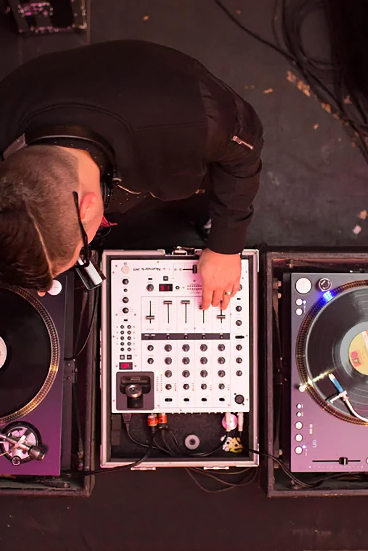 A DJ from above at turn tables