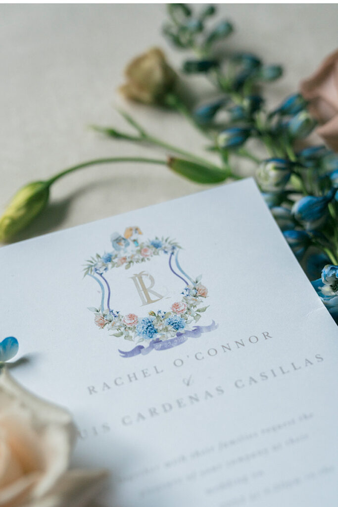 A close up of an invitation suite.
