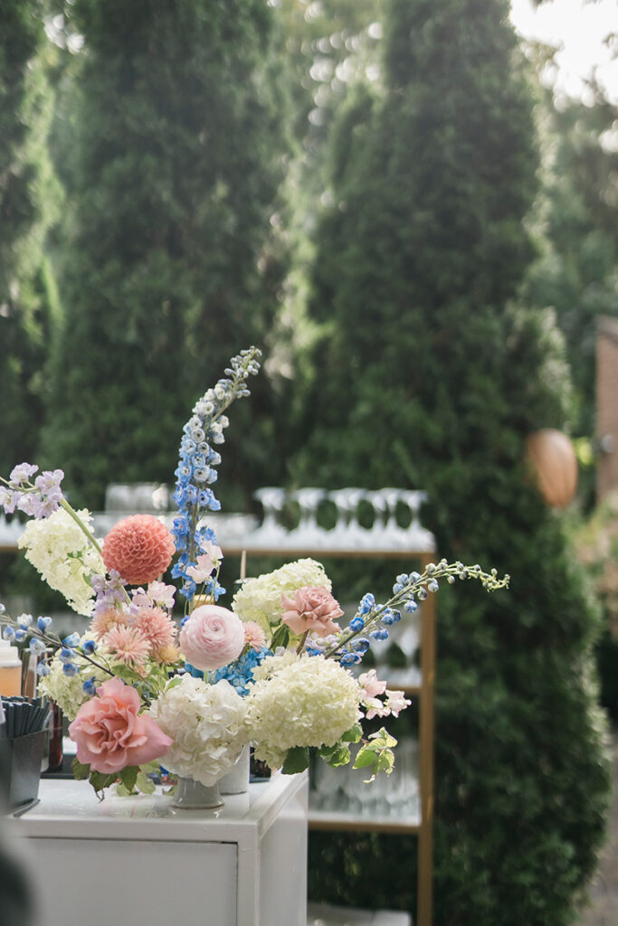 A floral arrangement on a bartop.