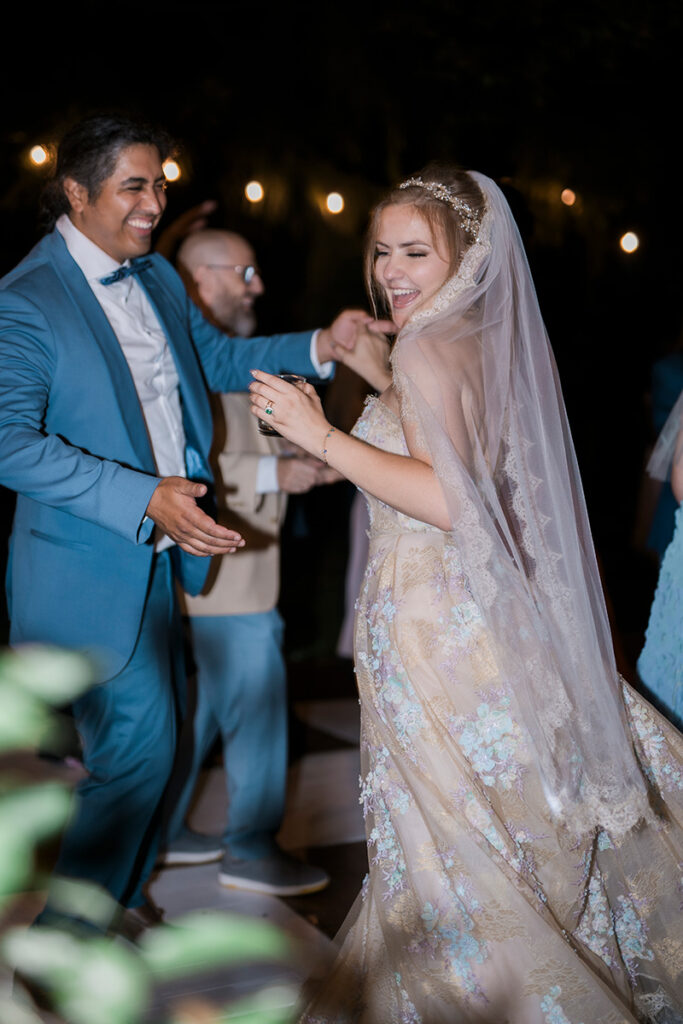 A couple dancing on their wedding night.
