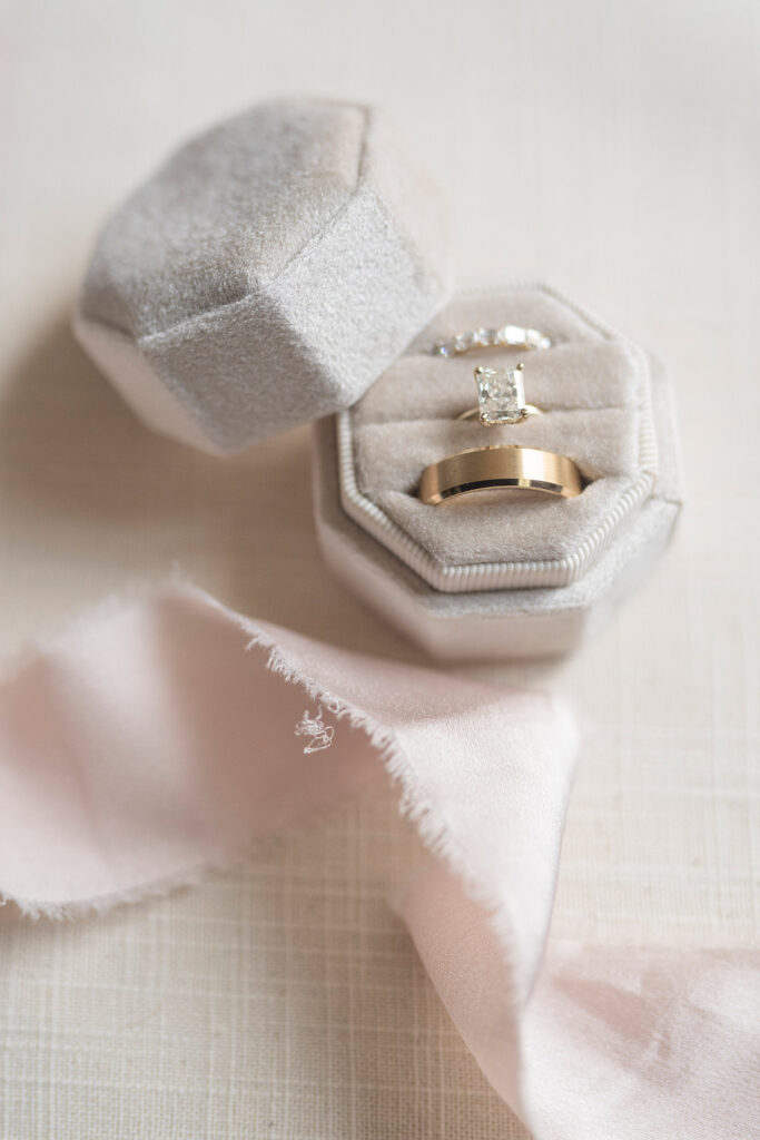 wedding band set and engagement ring in a velvet ring box