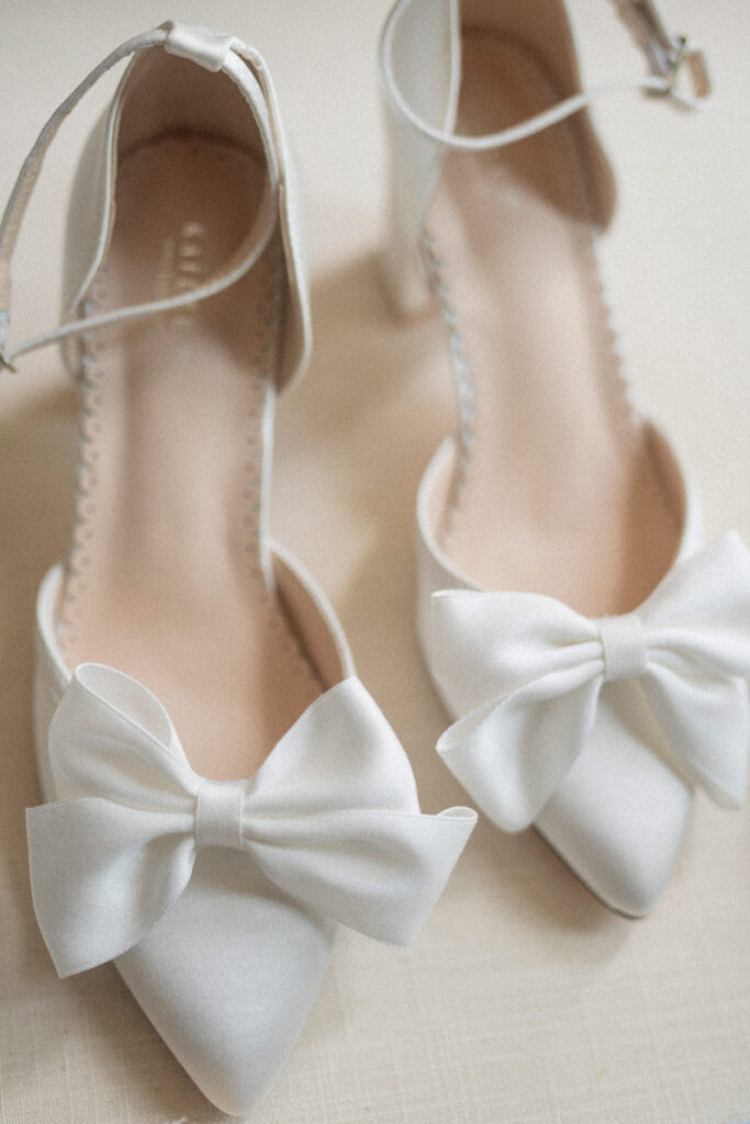 white bridal high heels with bow detail on toes