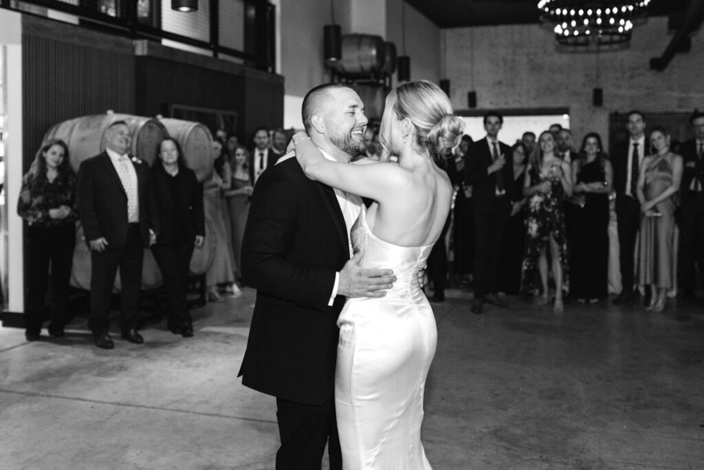 A black and white image of a couple dancing.