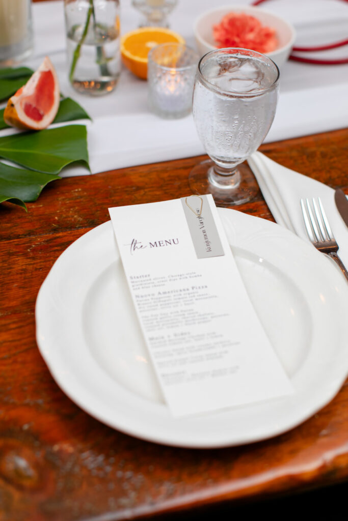 An angled image of a menu on a plate