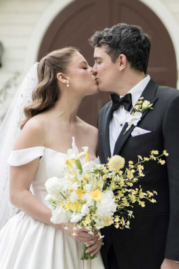 bride and groom outside the doctor's house chapel