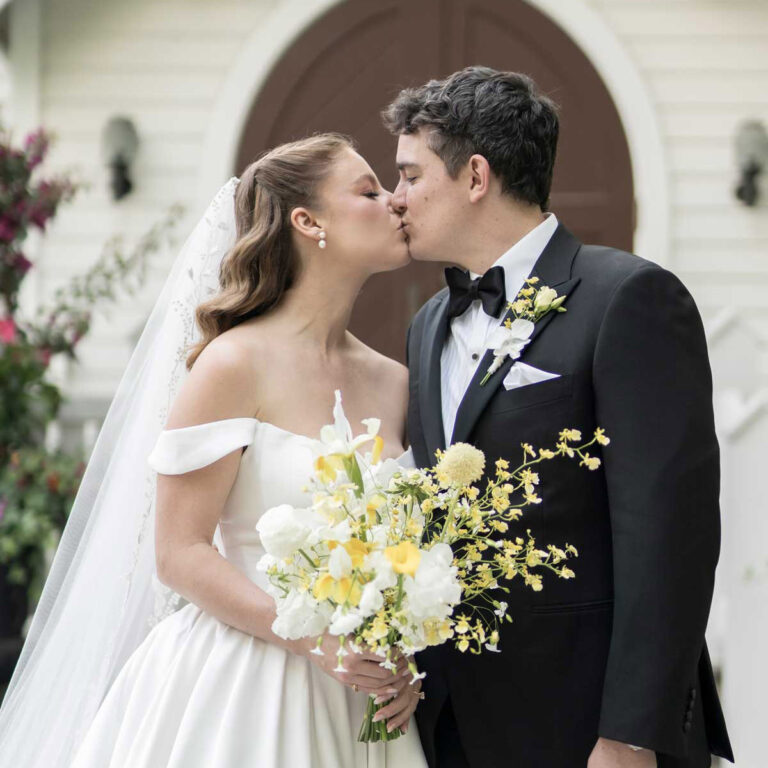 bride and groom outside the doctor's house chapel