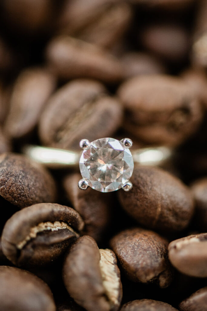 engagement ring in coffee beans