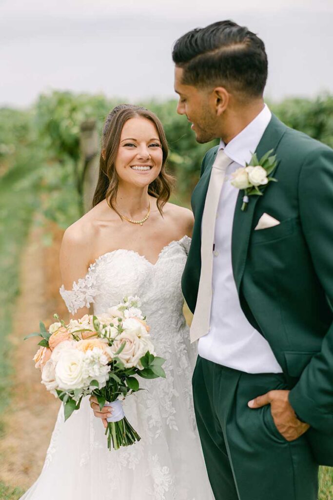bride and groom in vineyard