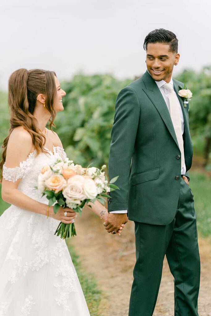 bride and groom in vineyard